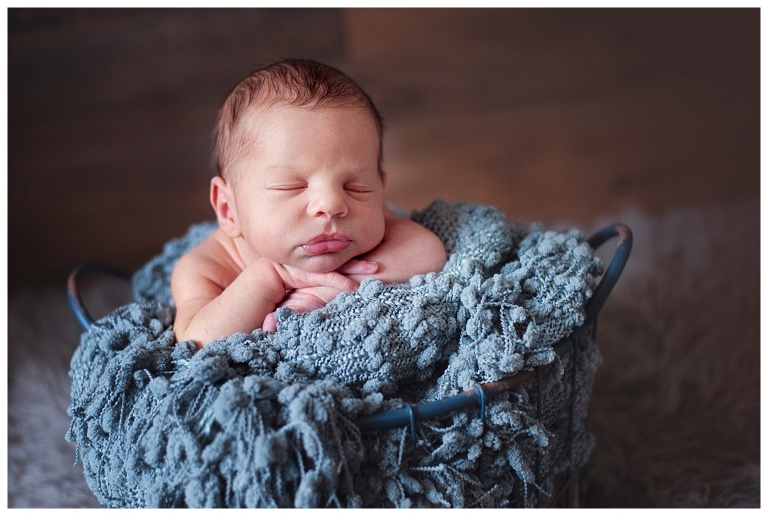 Pittsburgh posed newborn in blue basket