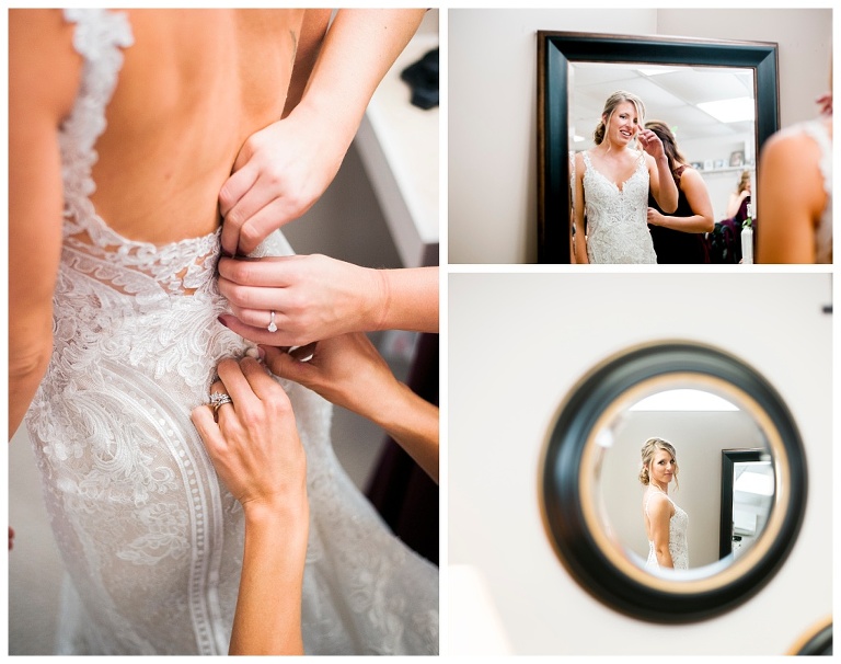 bride putting on dress at Destiny Hill Farm fall wedding