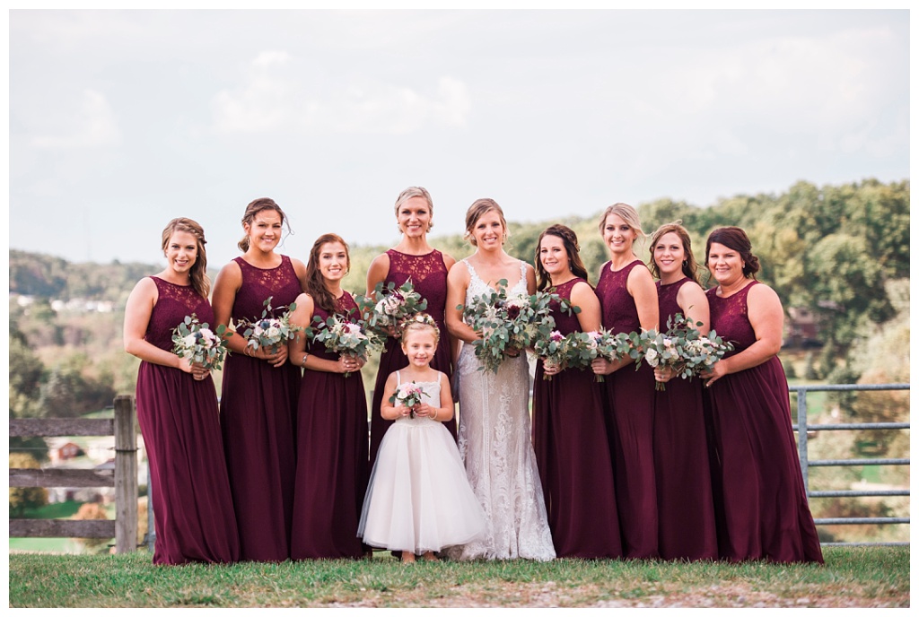 bride and bridesmaids in wine dresses at Destiny Hill Farm fall wedding