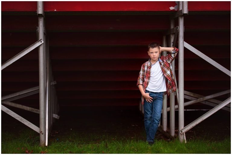 Pittsburgh boy child portrait session under bleachers at baseball field