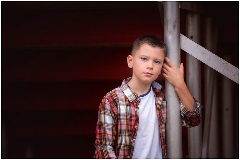 Pittsburgh boy child portrait session under bleachers at baseball field