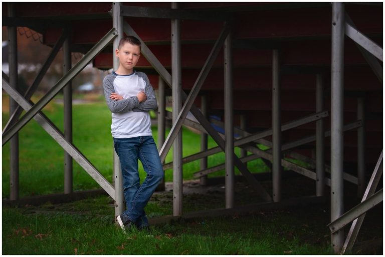 Pittsburgh boy child portrait session under bleachers at baseball field
